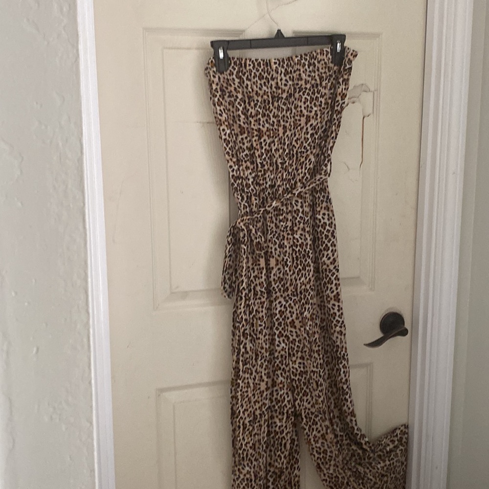 Cheats print strapless romper full length size medium.
